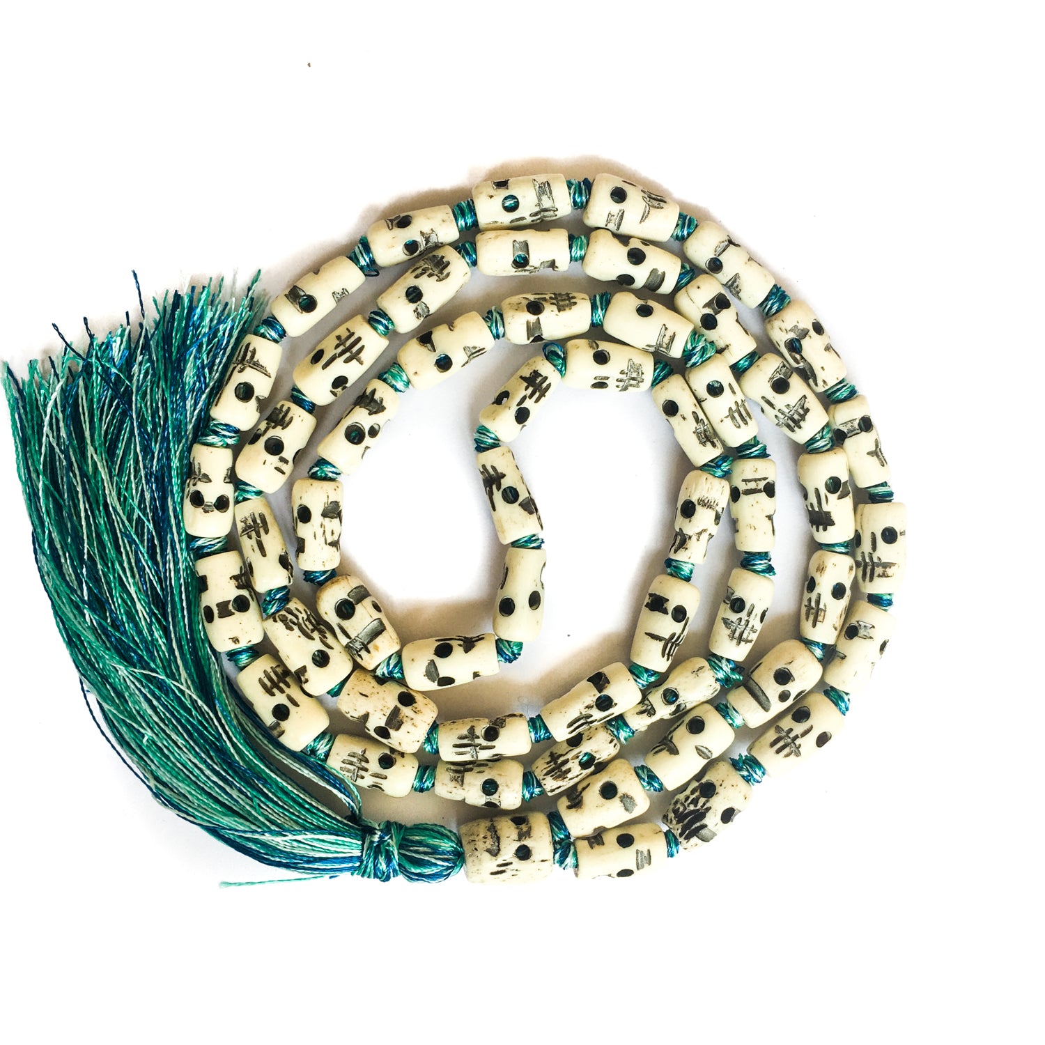 Kali skull hand carved bone half mala necklace with tri-color silk knots and tassel by IndiOdyssey