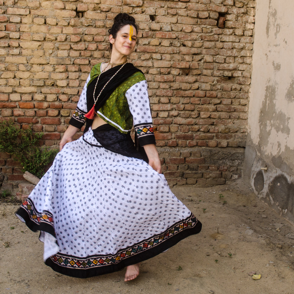 Handmade cotton skirt in white and batik border 32 panel Gopi skirt