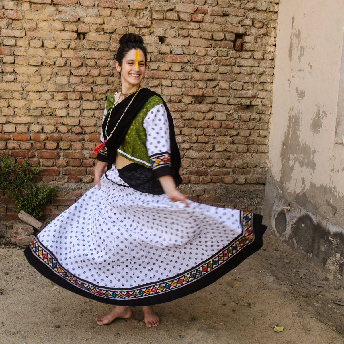 Handmade cotton skirt in white and batik border 32 panel Gopi skirt