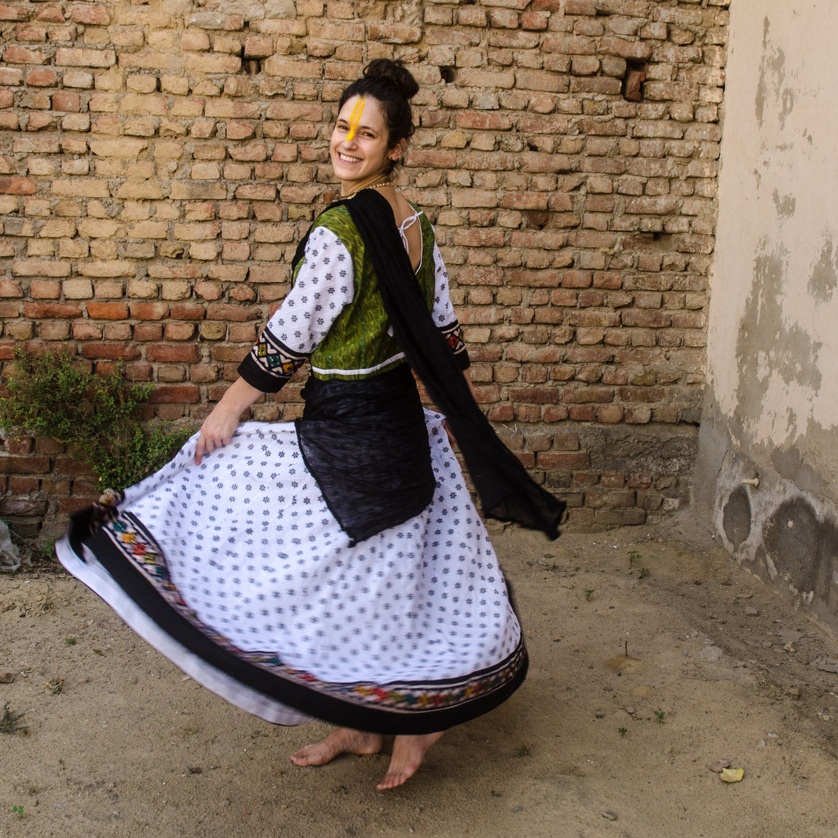 Handmade cotton skirt in white and batik border 32 panel Gopi skirt