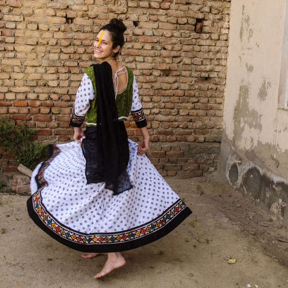 Handmade cotton skirt in white and batik border 32 panel Gopi skirt
