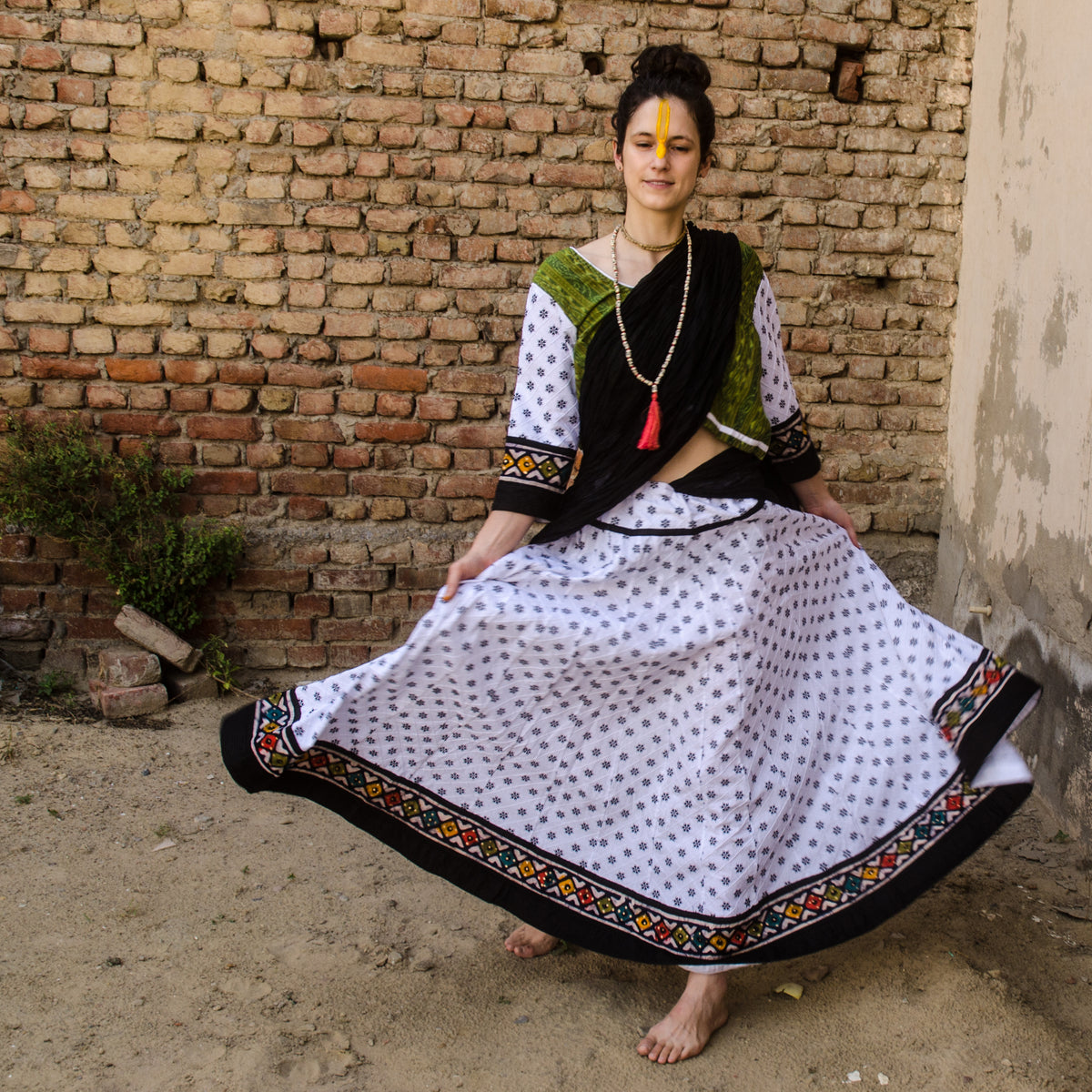 Handmade cotton skirt in white and batik border 32 panel Gopi skirt