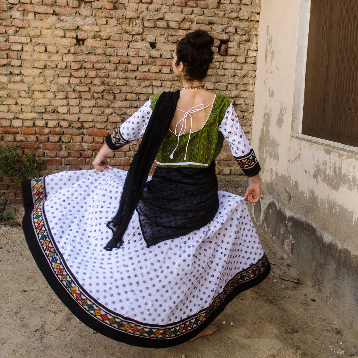 Handmade cotton skirt in white and batik border 32 panel Gopi skirt