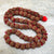 Large Rudrkasha Half Mala with Red Disc by Indiodyssey